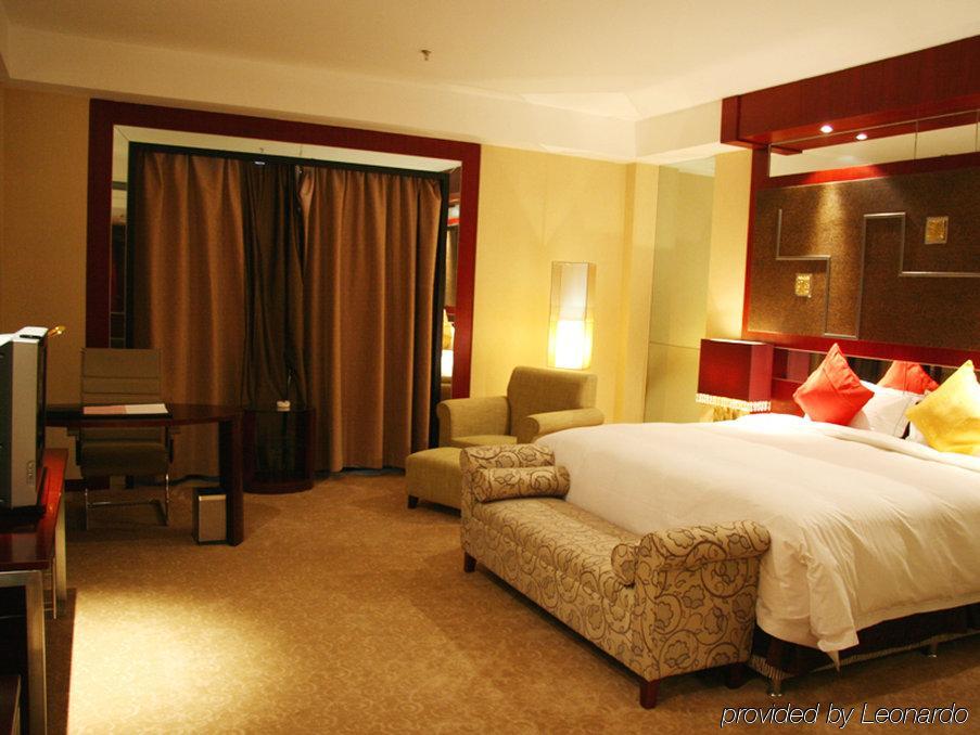 Grand Soluxe Hotel Tun-chuang Pokoj fotografie